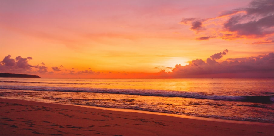 colourful sunset at tropical beach colourful sunset at tropical beach
